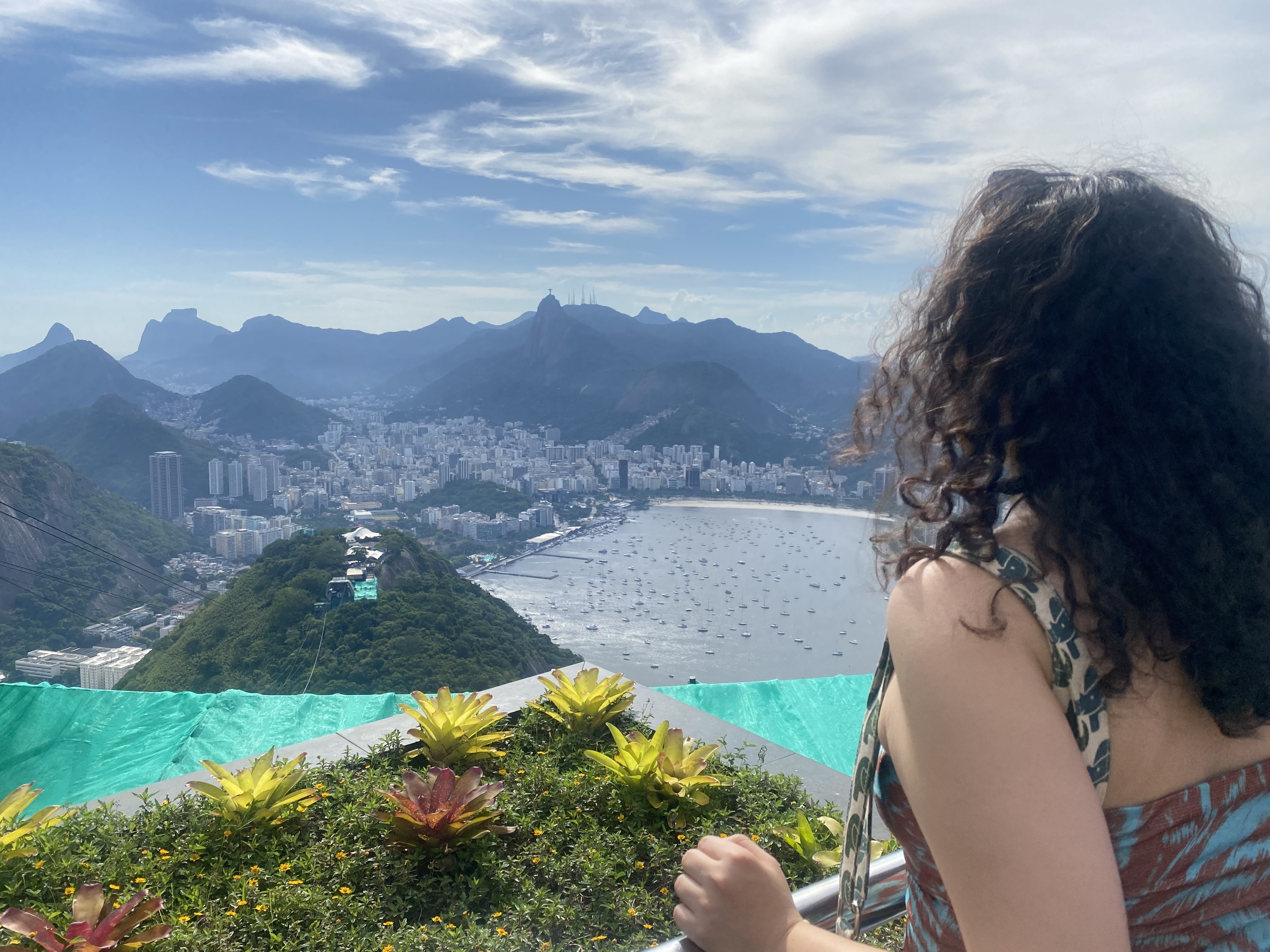 a picture of Claudia overlooking the wonderful city of Rio from a mountaintop